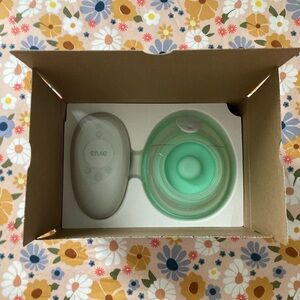 Elvie Breast Pump with Mint Green Accents